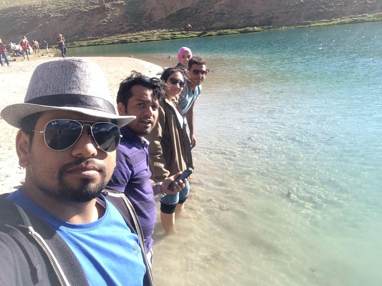 Friends from the first Spiti trip standing in a lake